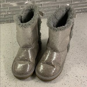 Silver boots with bows